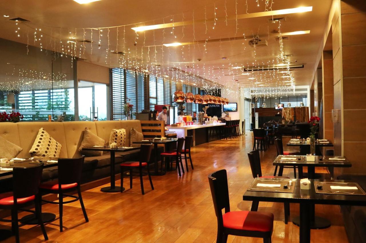 فندق Wyndham Concepcion Pettra المظهر الخارجي الصورة The interior of the restaurant