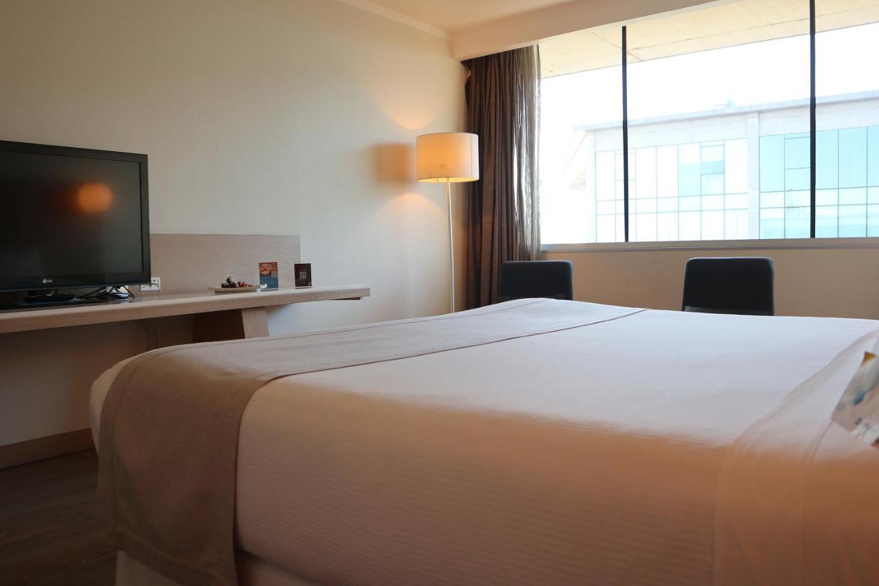فندق Wyndham Concepcion Pettra المظهر الخارجي الصورة A room at the hotel